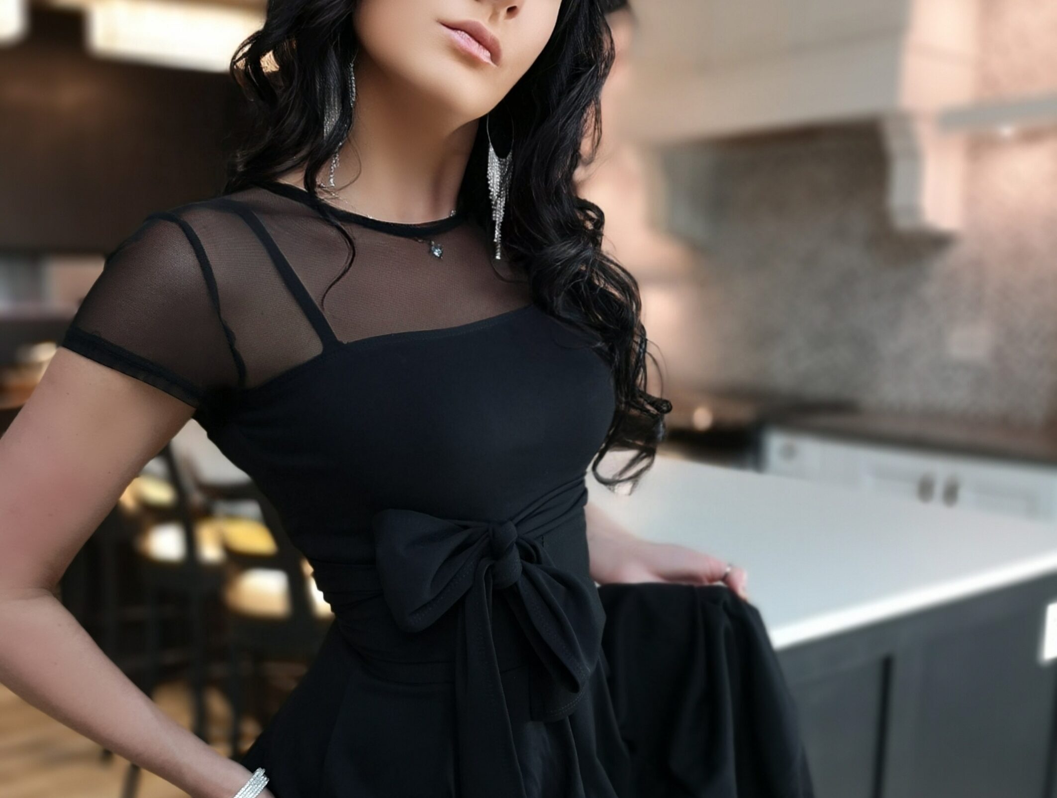 Short black bubble dress.