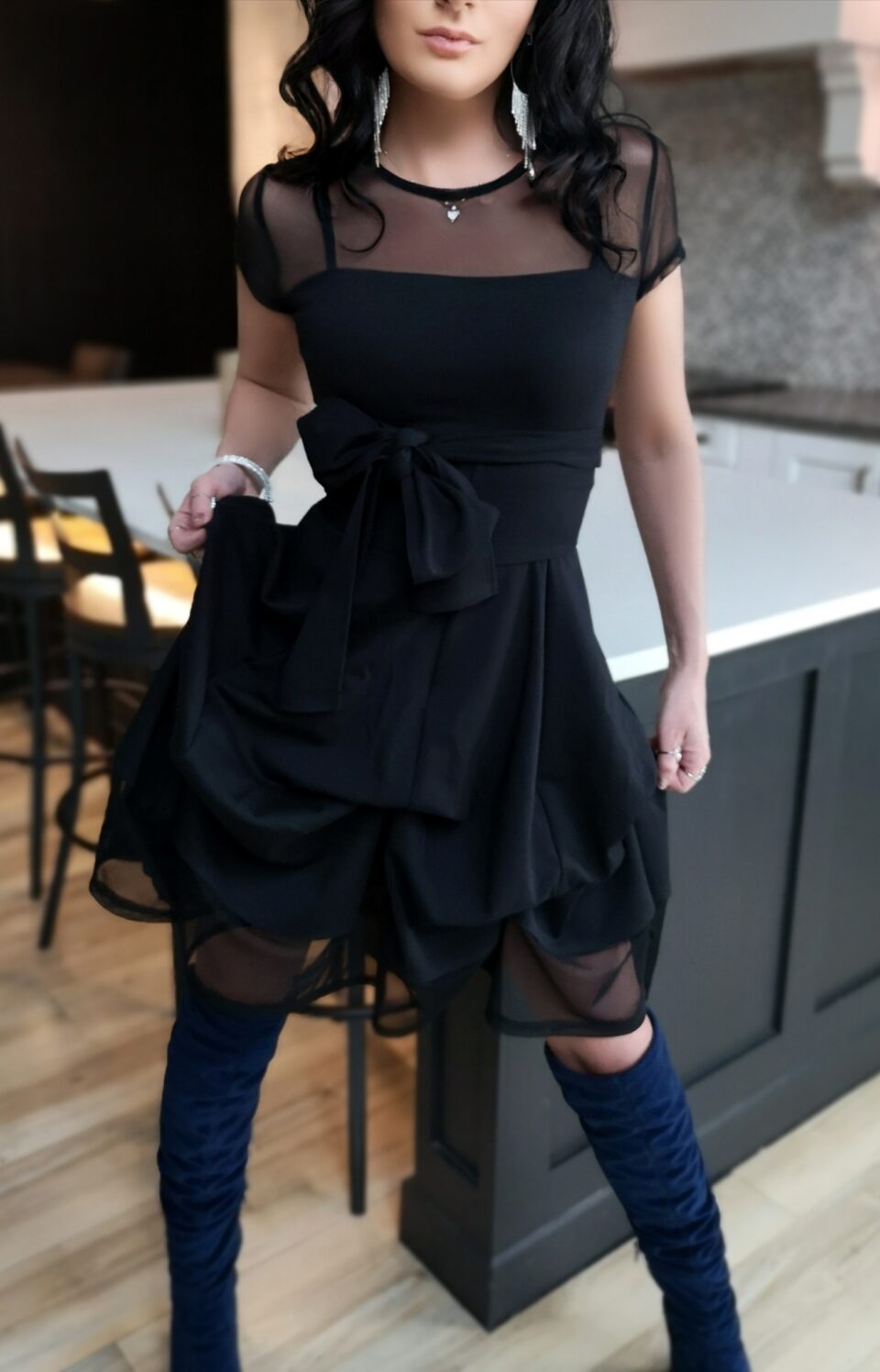 Short black bubble dress.