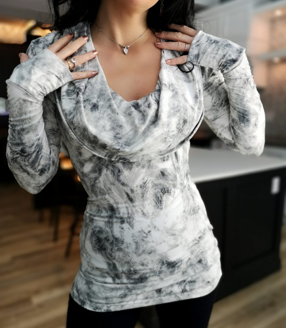 Hooded white and gray cowl neck top.