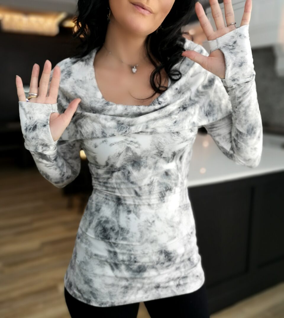 Hooded white and gray cowl neck top.