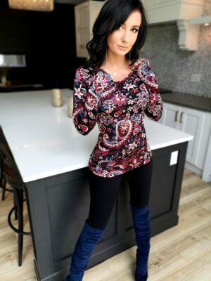 Red paisley cowl neck long-sleeve tunic top.