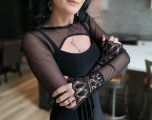 Black mesh crop jacket.