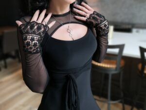 Black mesh half jacket with lace sleeves.