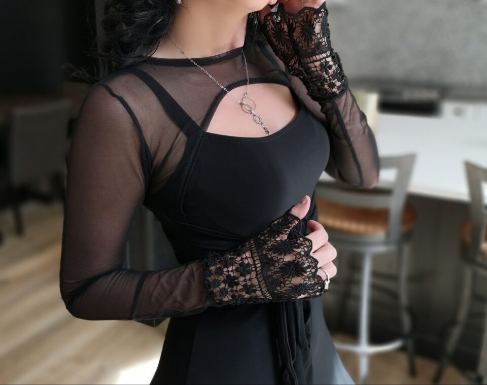 Black mesh crop jacket.