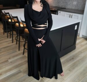 Black hooded long-sleeve crop top.