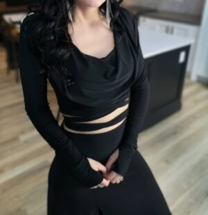 Black hooded long-sleeve crop top.