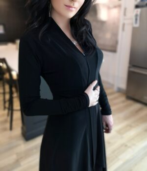 Long black cardigan, poly spandex blend.
