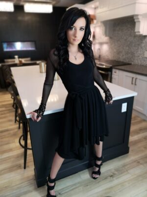 Tissue hem black mesh dress.