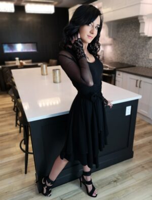 Tissue hem black mesh dress.