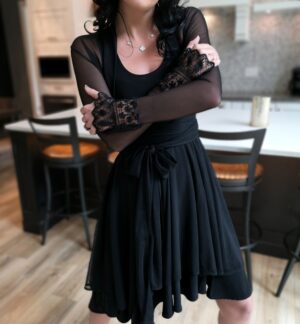 Tissue hem black mesh dress.