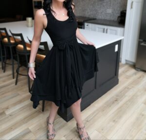 Tissue hem black mesh dress.