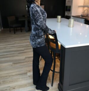 Draping speckled gray long-sleeve top.