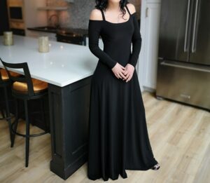Cold shoulder long-sleeve black maxi dress.
