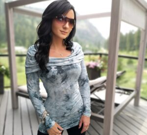 Tie-dye green hooded bamboo long-sleeve top.