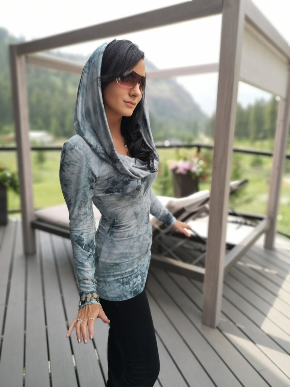 Tie-dye green hooded bamboo long-sleeve top.