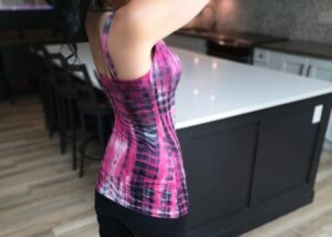 Pink and black tank top.