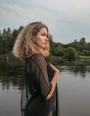 Black mesh swimsuit/dress jacket.