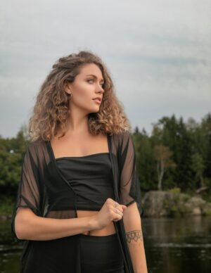 Black mesh swimsuit/dress jacket.