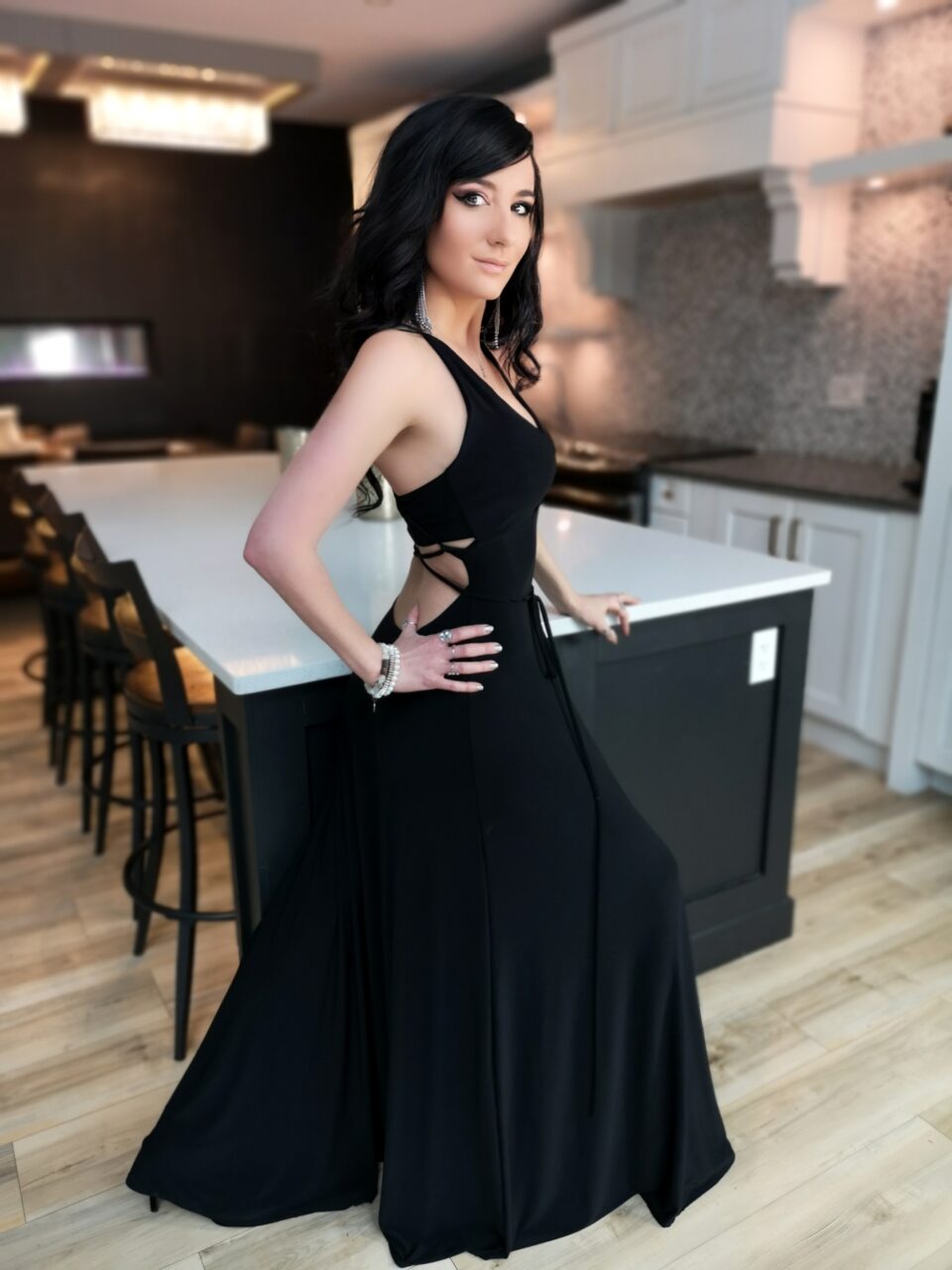Black maxi v-neck backless dress.