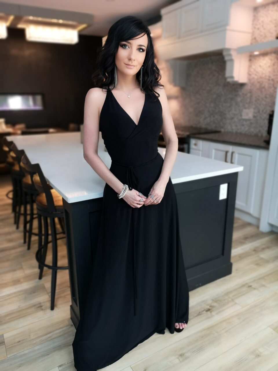 Black maxi v-neck backless dress.