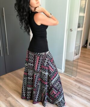 Red and white on black geometrical print floor length printed skirt.