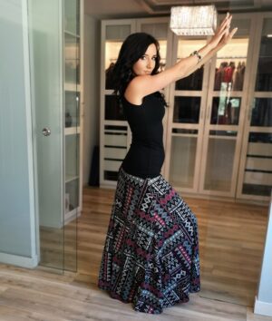 Red and white on black geometrical print floor length printed skirt.