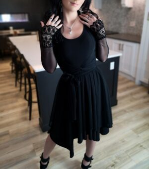 Tissue hem black mesh dress.