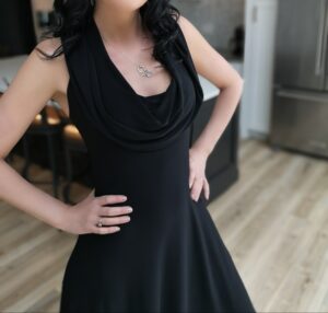 Black sleek hooded sleeveless maxi dress.