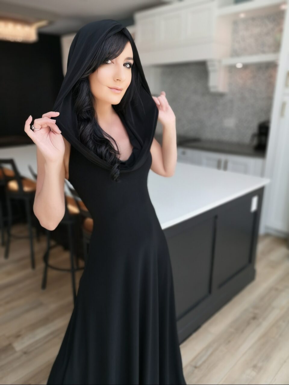 Black hooded maxi dress.