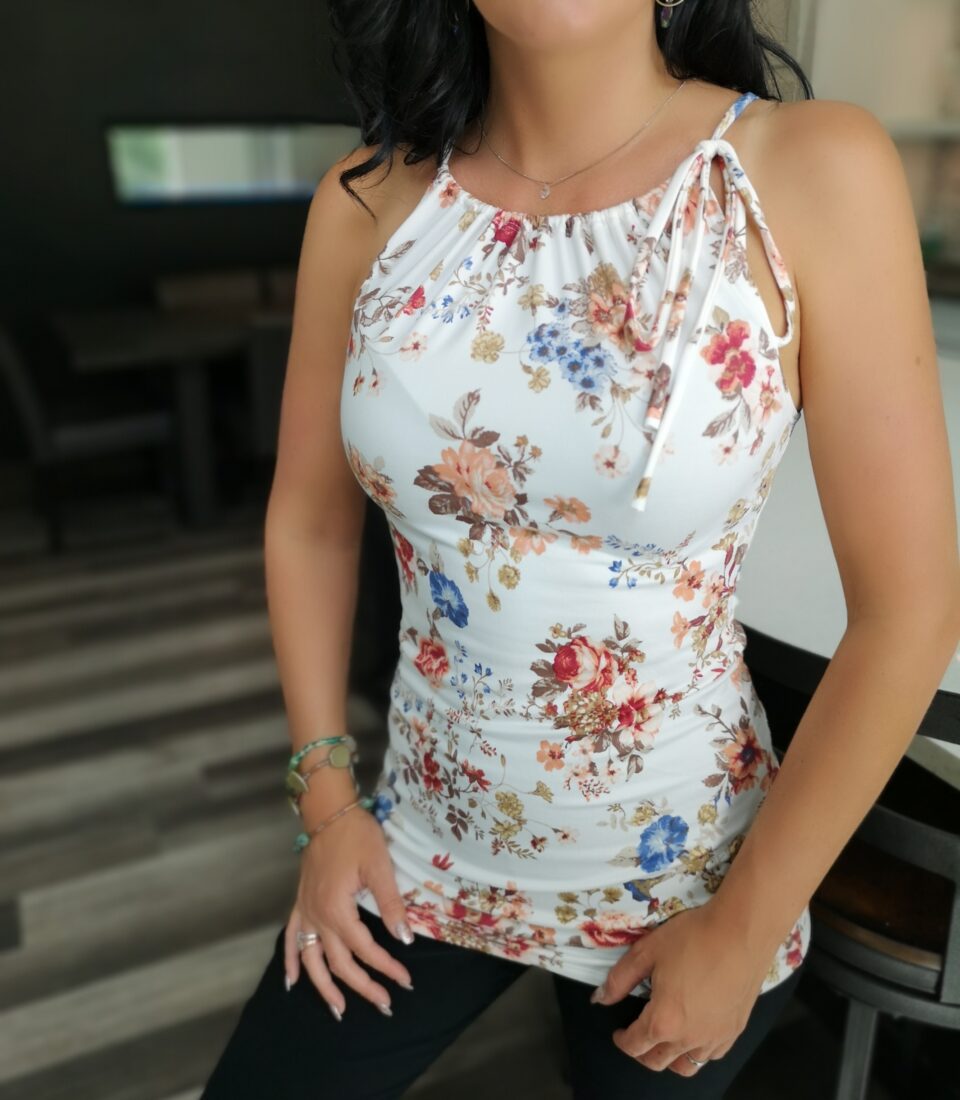 Ivory floral print fitted top.