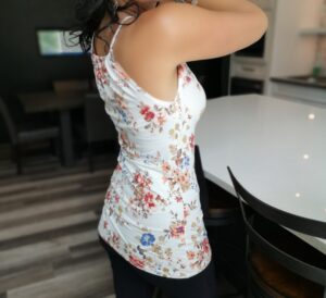 Ivory floral print fitted top.