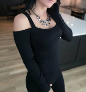 Exposed shoulder long sleeve black tunic top.