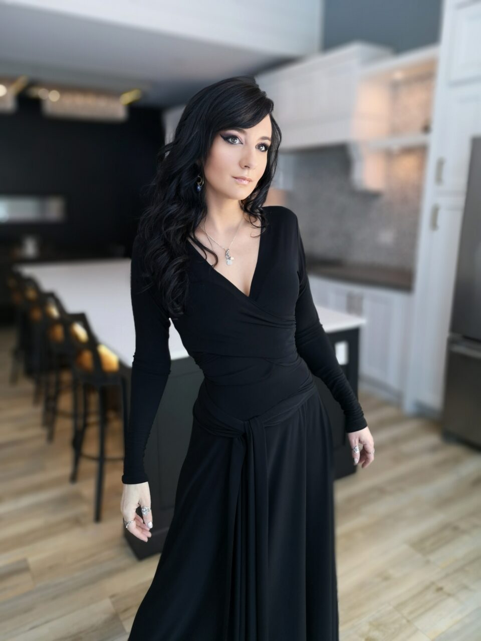 V-neck long black maxi dress.