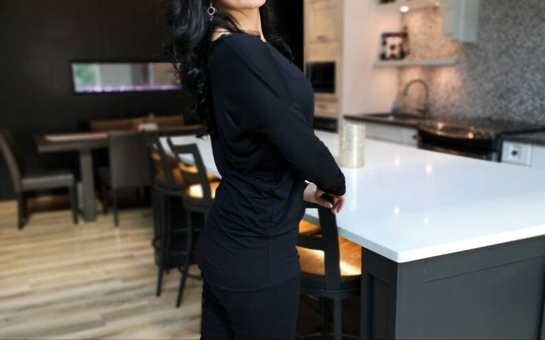 Soft and comfortable draped black top.