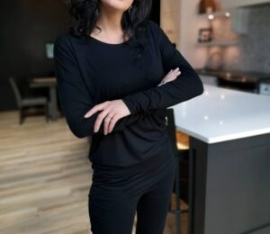 Soft and comfortable draped black top.