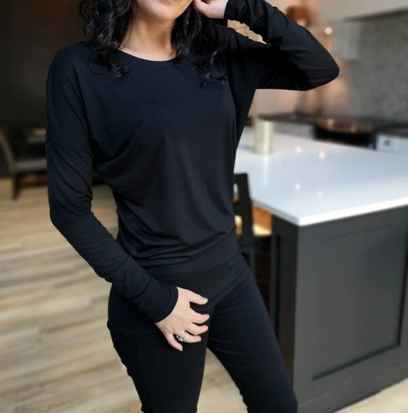 Soft and comfortable draped black top.