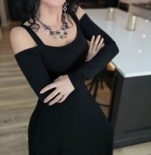 Exposed shoulder black maxi dress.