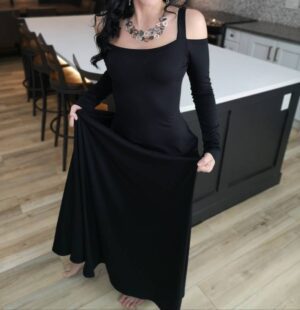 Exposed shoulder black maxi dress.