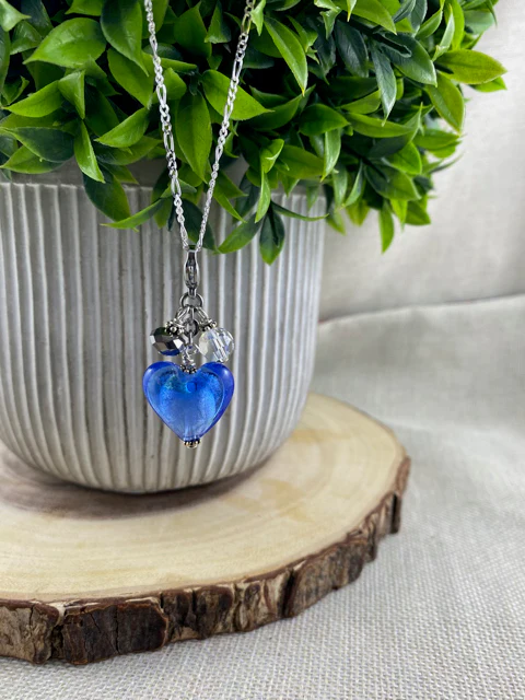 Blue glass heart charm.