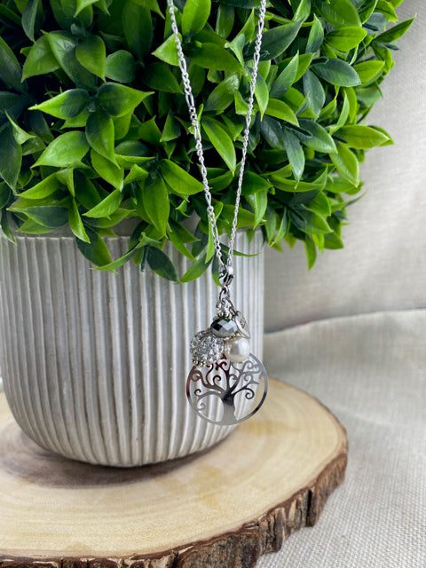 Silver beautiful round tree charm.