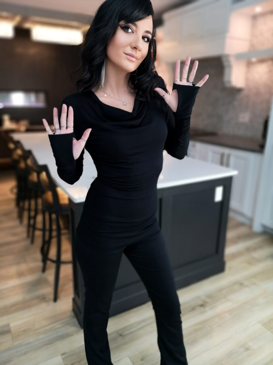 Black soft bamboo long-sleeve cowl neck top.