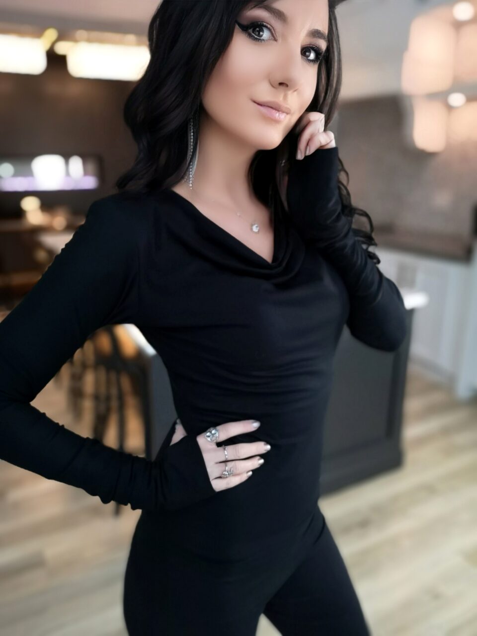 Black soft bamboo long-sleeve cowl neck top.