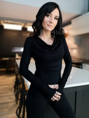 Black soft bamboo long-sleeve cowl neck top.