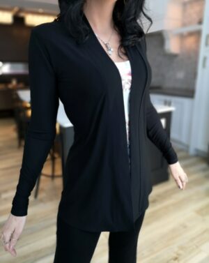 Fitted long sleeve black cardigan.