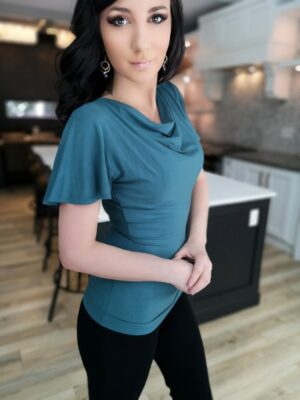 Ocean blue cowl neck top.