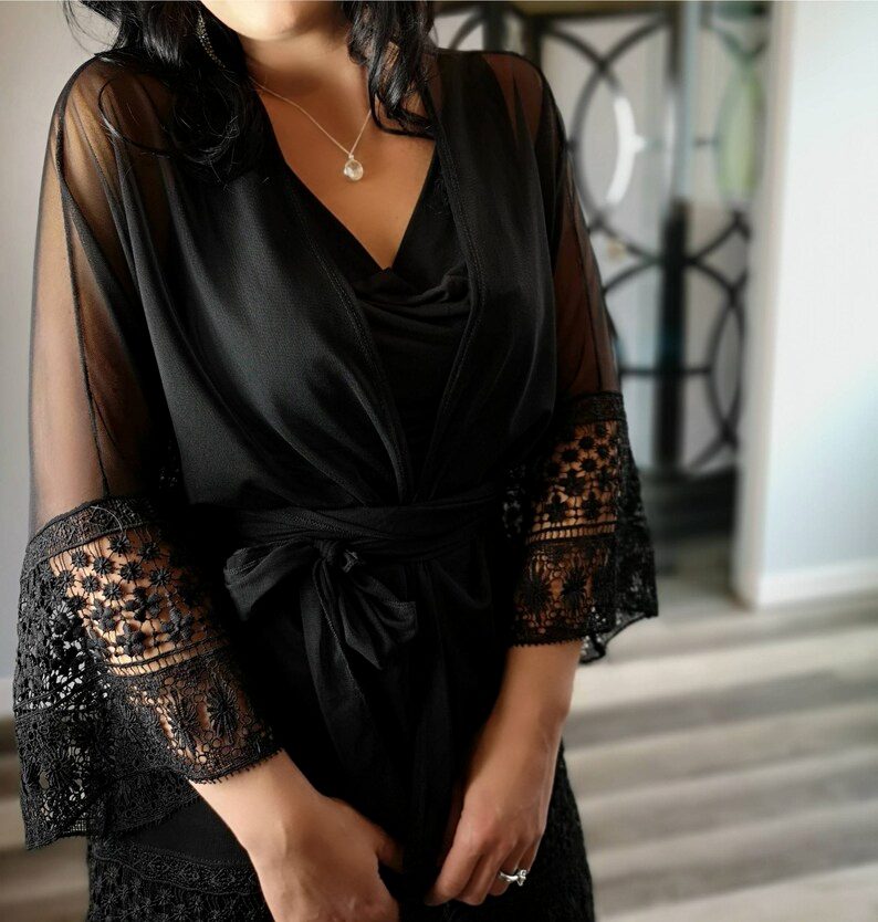 Black mesh draping cardigan.