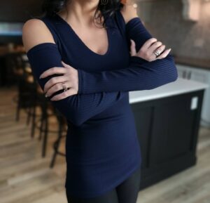 Navy blue ribbed long-sleeve top.
