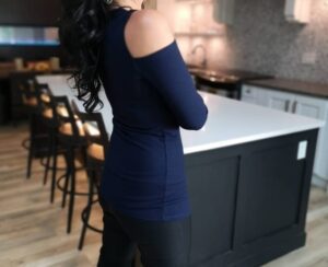 Navy blue ribbed long-sleeve top.