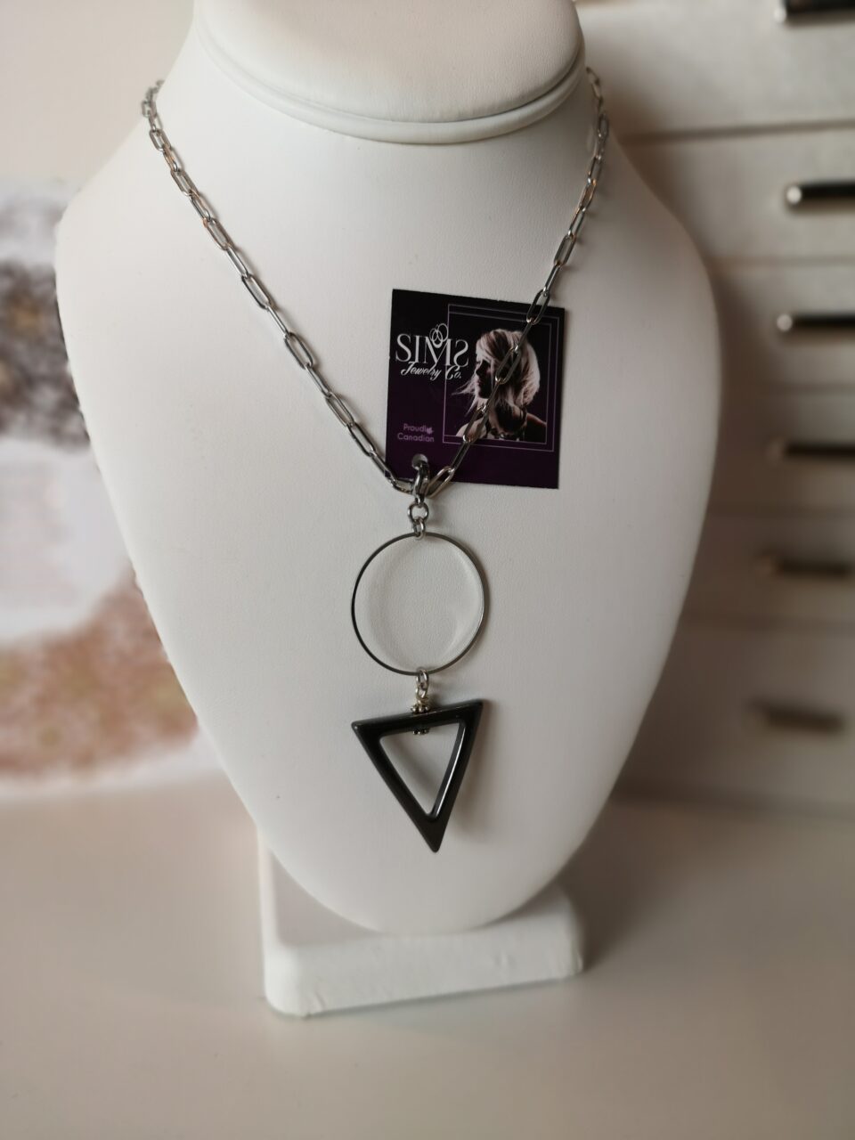 Black triangle pendant stone with a stunning circle.