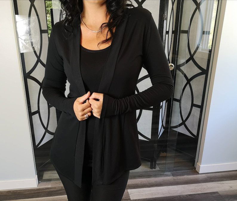 Black long-sleeve cardigan, rayon blend.